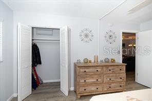 11720 Park Blvd Unit 301, Seminole, FL 33772 - bedroom featuring a closet