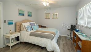 11720 Park Blvd Unit 301, Seminole, FL 33772 - bedroom with wood finished floors