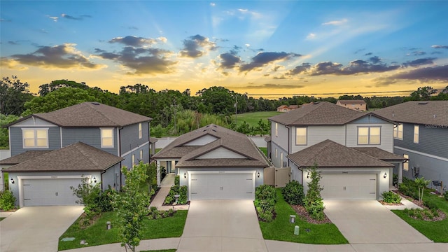 20659 Drake Elm Dr, Land O Lakes, FL 34638 - traditional-style house with concrete driveway, a garage, and a residential view