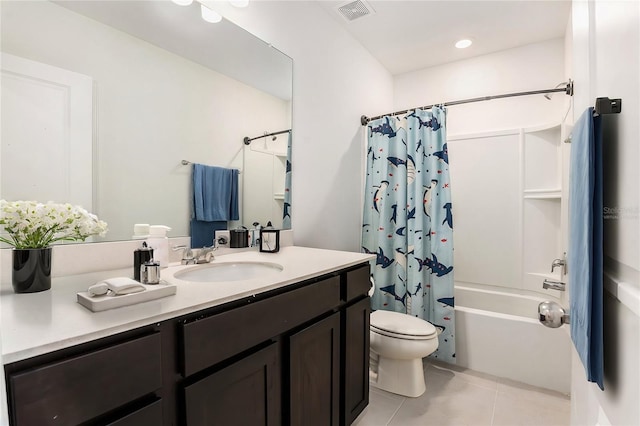 20659 Drake Elm Dr, Land O Lakes, FL 34638 - full bath with vanity, tile patterned floors, toilet, and shower / bath combo with shower curtain