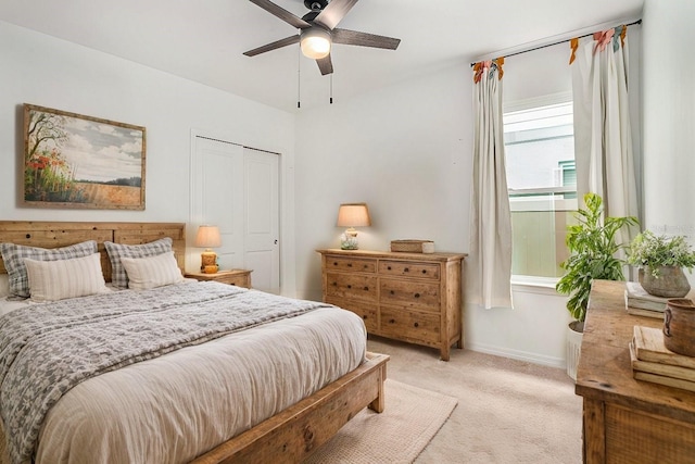 20659 Drake Elm Dr, Land O Lakes, FL 34638 - bedroom featuring light colored carpet, baseboards, and a ceiling fan