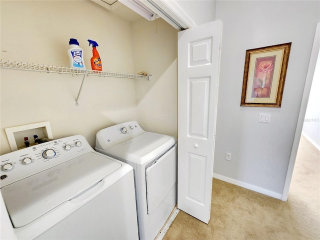 8796 Christie Dr, Largo, FL 33771 - laundry room featuring independent washer and dryer, light colored carpet, and baseboards