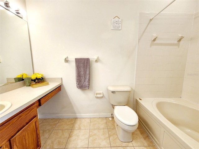 8796 Christie Dr, Largo, FL 33771 - full bath featuring toilet, vanity, tile patterned flooring, baseboards, and bathing tub / shower combination
