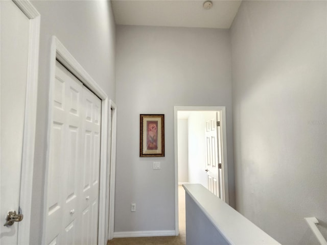 8796 Christie Dr, Largo, FL 33771 - hallway featuring carpet and baseboards