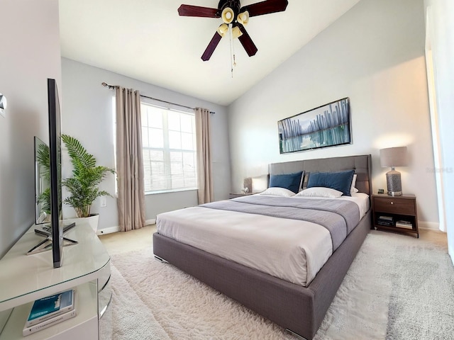 8796 Christie Dr, Largo, FL 33771 - carpeted bedroom featuring vaulted ceiling, baseboards, and a ceiling fan