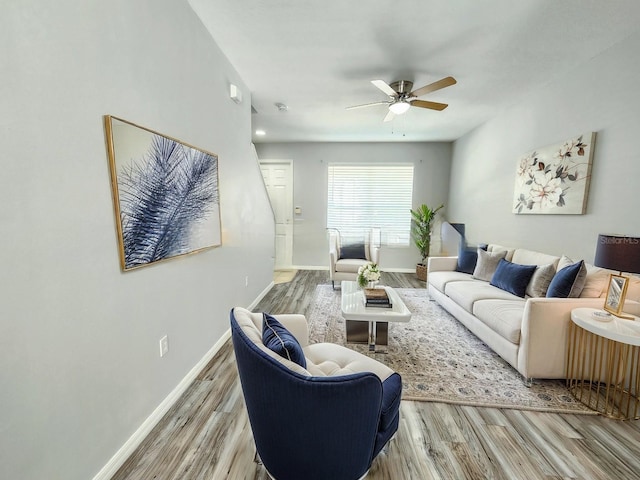 8796 Christie Dr, Largo, FL 33771 - living room featuring wood finished floors, a ceiling fan, and baseboards