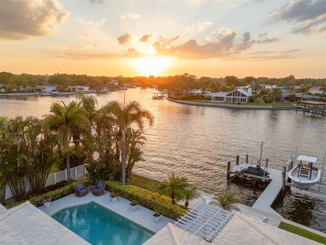 dock area featuring a water view and boat lift