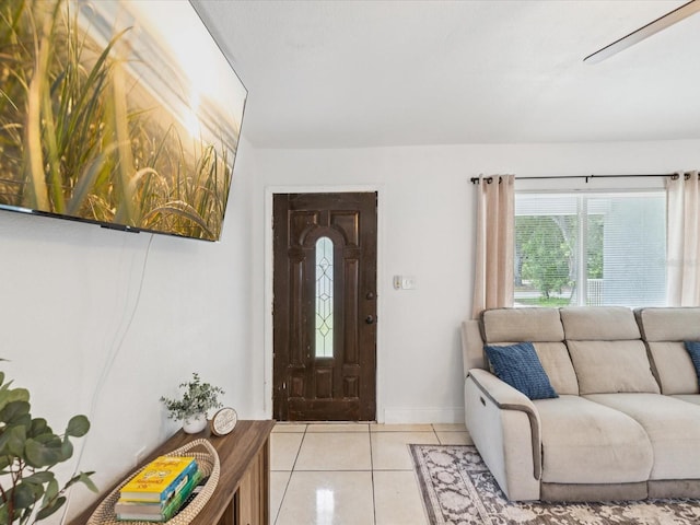 232 Emerald Ln, Largo, FL 33771 - entrance foyer with light tile patterned flooring and baseboards