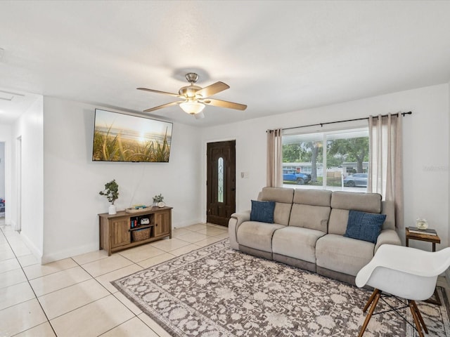 232 Emerald Ln, Largo, FL 33771 - living area featuring light tile patterned floors and ceiling fan