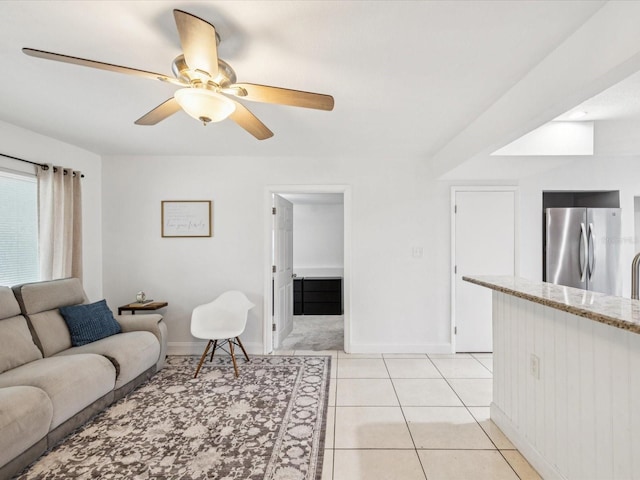 232 Emerald Ln, Largo, FL 33771 - living area featuring a ceiling fan and light tile patterned floors