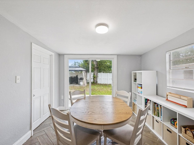 232 Emerald Ln, Largo, FL 33771 - dining room with baseboards