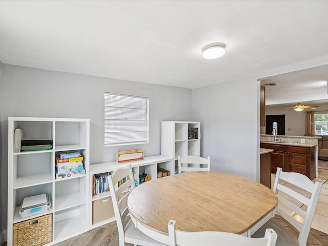 232 Emerald Ln, Largo, FL 33771 - dining room with a ceiling fan