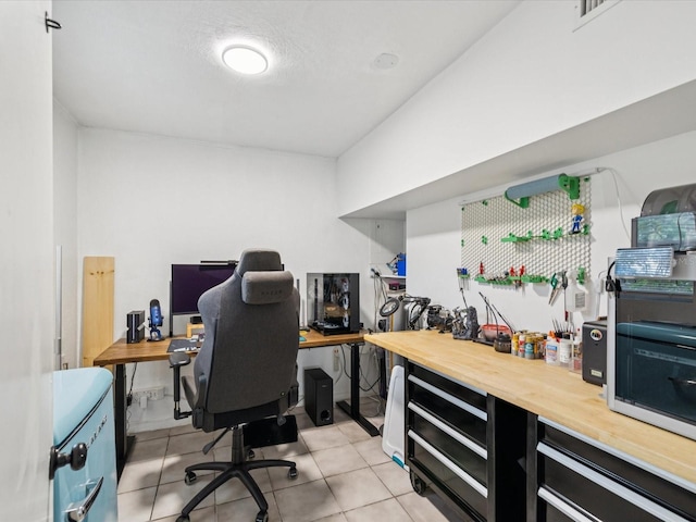 232 Emerald Ln, Largo, FL 33771 - home office featuring light tile patterned floors