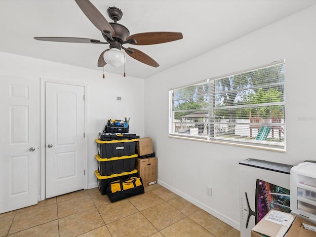 232 Emerald Ln, Largo, FL 33771 - office featuring ceiling fan and light tile patterned floors