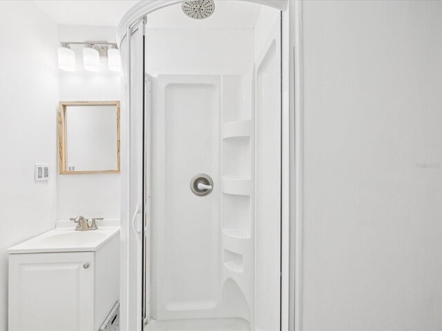 232 Emerald Ln, Largo, FL 33771 - bathroom with a shower stall and vanity