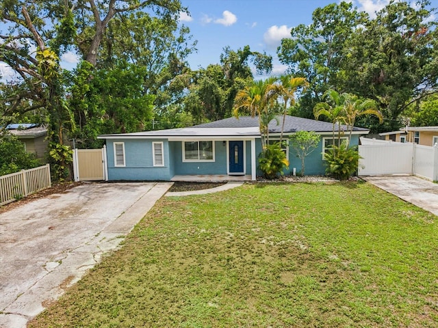 232 Emerald Ln, Largo, FL 33771 - ranch-style house featuring driveway