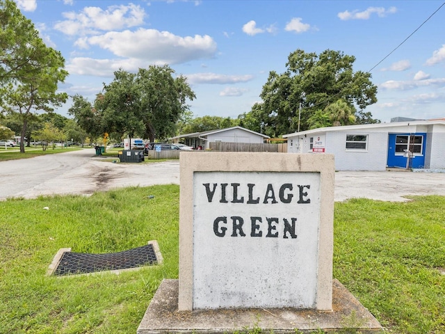 232 Emerald Ln, Largo, FL 33771 - community / neighborhood sign with a lawn