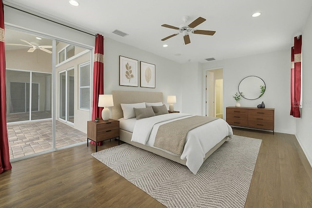 bedroom with visible vents, recessed lighting, wood finished floors, and access to exterior