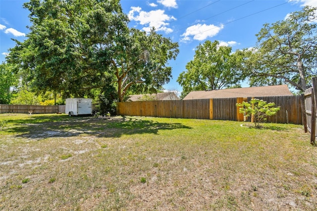 view of yard featuring a fenced backyard