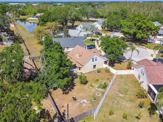 aerial view with a residential view and a water view