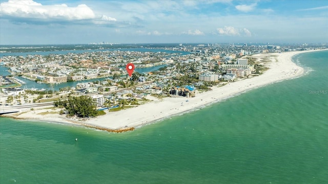 bird's eye view featuring a city view, a view of the beach, and a water view