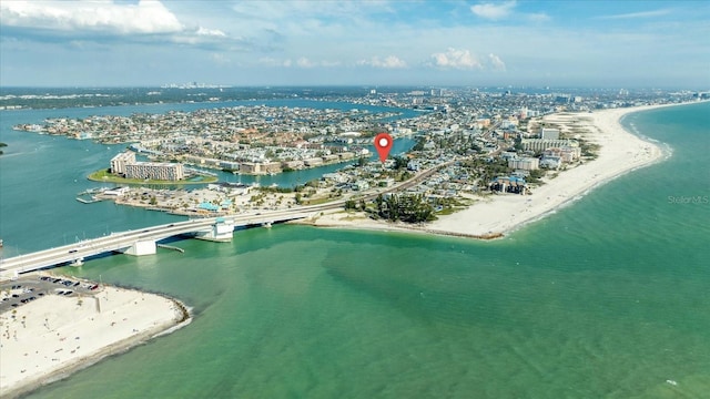 bird's eye view featuring a city view, a view of the beach, and a water view
