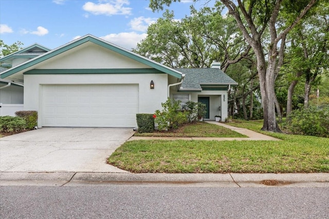 235 Woodridge Cir, Oldsmar, FL 34677 - ranch-style house featuring an attached garage, a chimney, driveway, and stucco siding