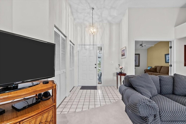 235 Woodridge Cir, Oldsmar, FL 34677 - entrance foyer featuring light tile patterned flooring and a towering ceiling