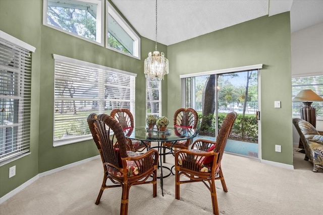 235 Woodridge Cir, Oldsmar, FL 34677 - dining area featuring a healthy amount of sunlight, an inviting chandelier, and carpet