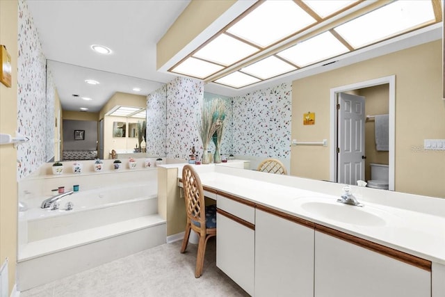 235 Woodridge Cir, Oldsmar, FL 34677 - bathroom with a bath, wallpapered walls, vanity, and recessed lighting