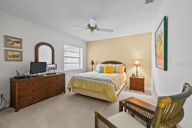 235 Woodridge Cir, Oldsmar, FL 34677 - carpeted bedroom featuring visible vents, a ceiling fan, and a textured ceiling