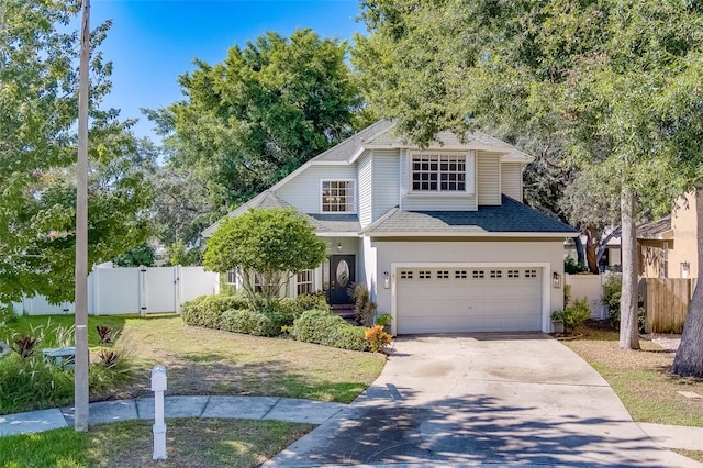 11386 Churchhill Trl, Seminole, FL 33772 - traditional home with an attached garage, fence, a gate, and concrete driveway