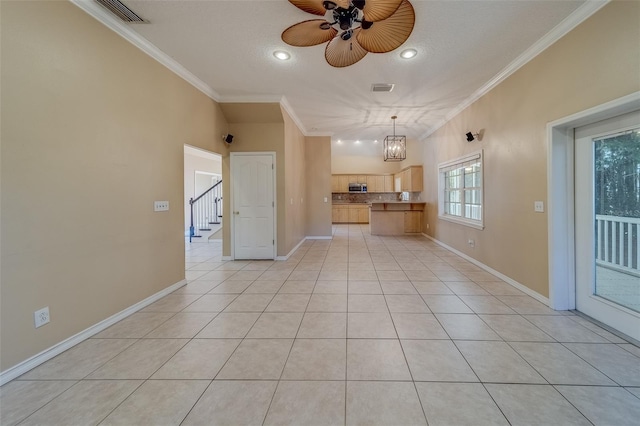 11386 Churchhill Trl, Seminole, FL 33772 - unfurnished living room featuring visible vents, ceiling fan with notable chandelier, crown molding, and light tile patterned flooring