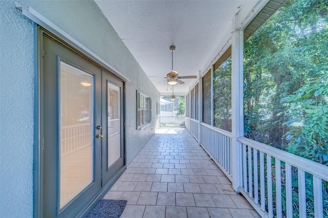 11386 Churchhill Trl, Seminole, FL 33772 - unfurnished sunroom featuring a ceiling fan