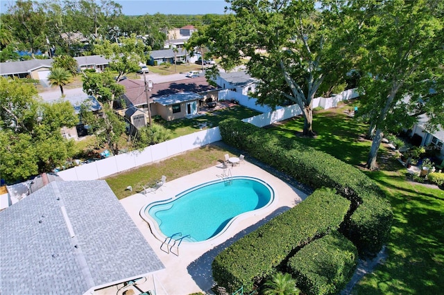 birds eye view of property with a residential view