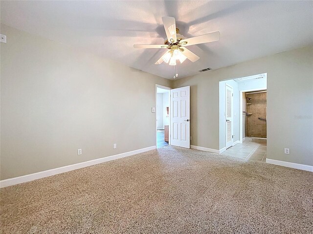 1535 Nursery Rd Unit 107, Clearwater, FL 33756 - spare room with ceiling fan, baseboards, and light carpet