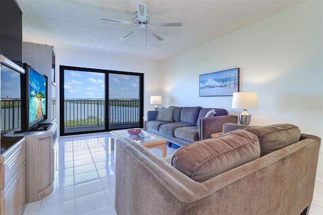 living room with light tile patterned floors and a ceiling fan