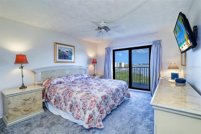 bedroom with a ceiling fan, access to exterior, and carpet floors