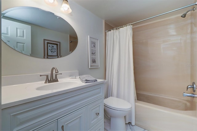 bathroom featuring shower / bath combo with shower curtain, vanity, and toilet