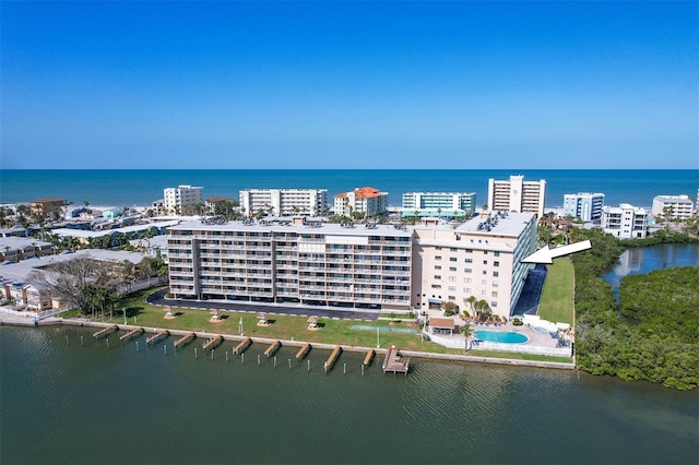 drone / aerial view with a water view