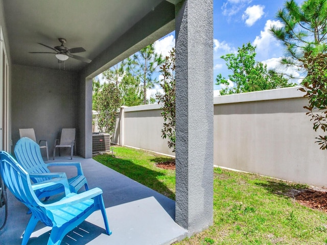 view of patio / terrace with central air condition unit, a fenced backyard, and ceiling fan