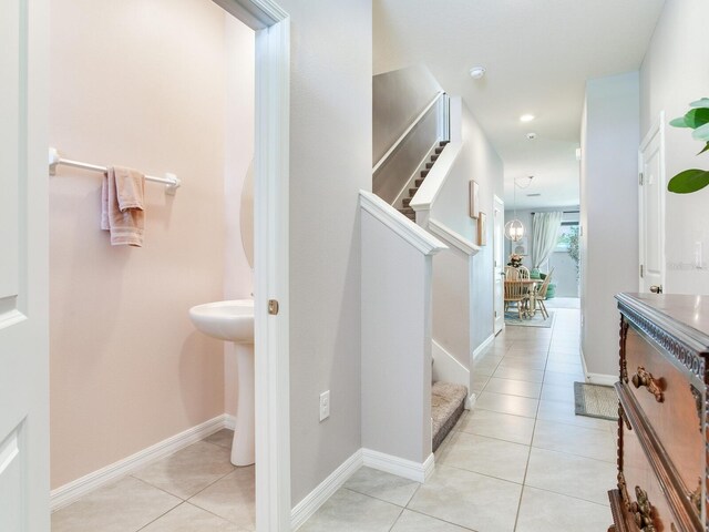 bathroom with tile patterned flooring