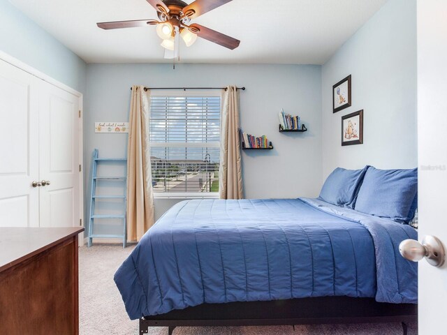 bedroom featuring carpet and ceiling fan