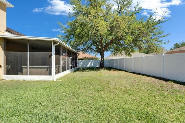 view of yard featuring a sunroom