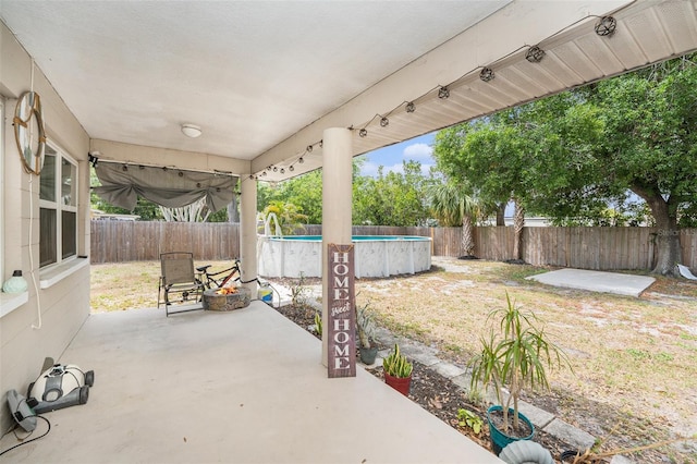 831 72nd Ave N, Saint Petersburg, FL 33702 - view of patio featuring a fenced in pool and a fenced backyard