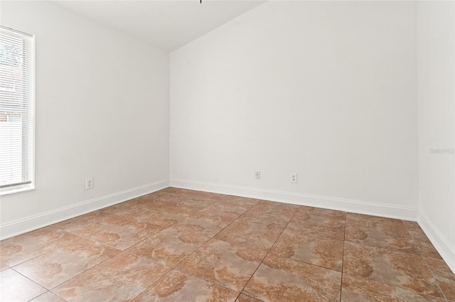 18005 Palm Breeze Dr, Tampa, FL 33647 - unfurnished room with baseboards