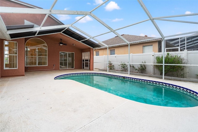 18005 Palm Breeze Dr, Tampa, FL 33647 - view of pool with a fenced in pool, a patio, a lanai, ceiling fan, and fence