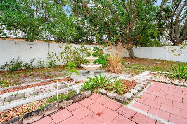 18005 Palm Breeze Dr, Tampa, FL 33647 - exterior space with a fenced backyard and a patio area