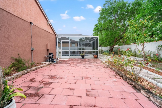 18005 Palm Breeze Dr, Tampa, FL 33647 - view of patio with a fenced backyard and a lanai