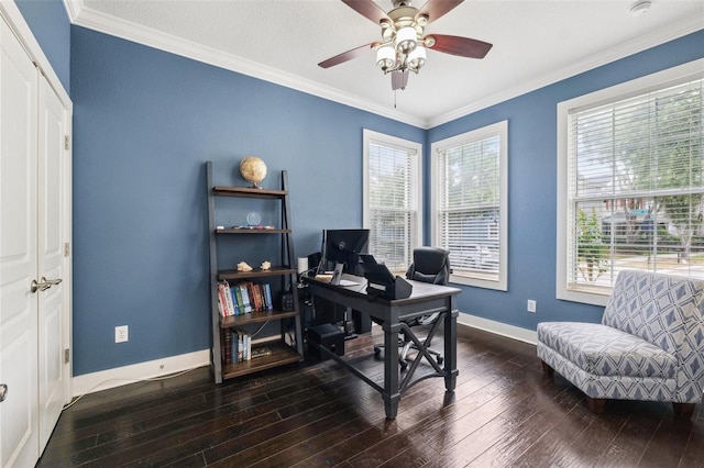 office space featuring crown molding, ceiling fan, hardwood / wood-style floors, and baseboards